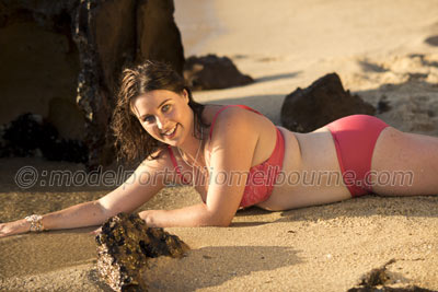 lingerie modelling, girl lying on sand, Melbourne